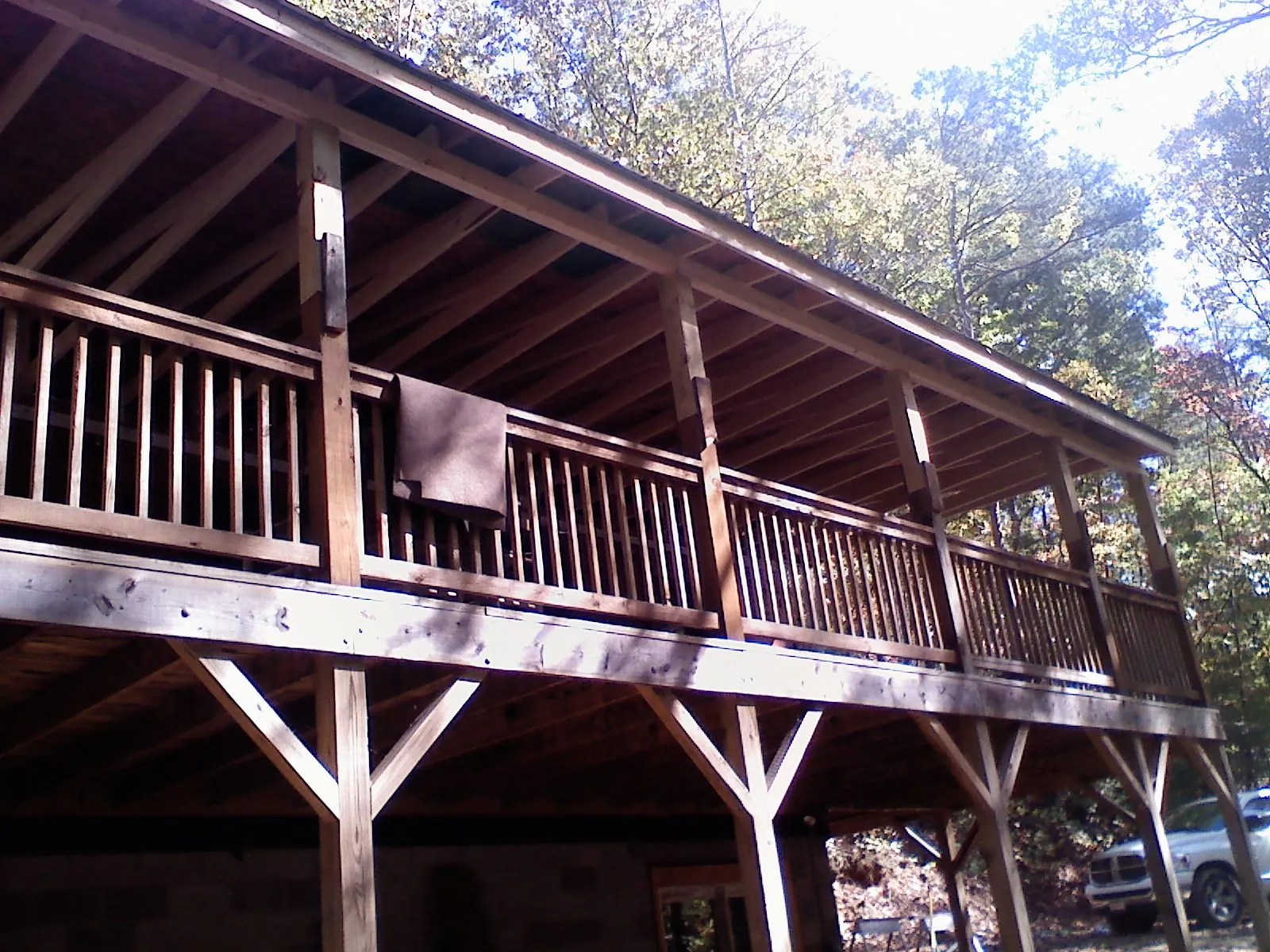 Timber framing under a new elevated porch and deck — Roof Leak Repair in Potterville by Roofing Brothers